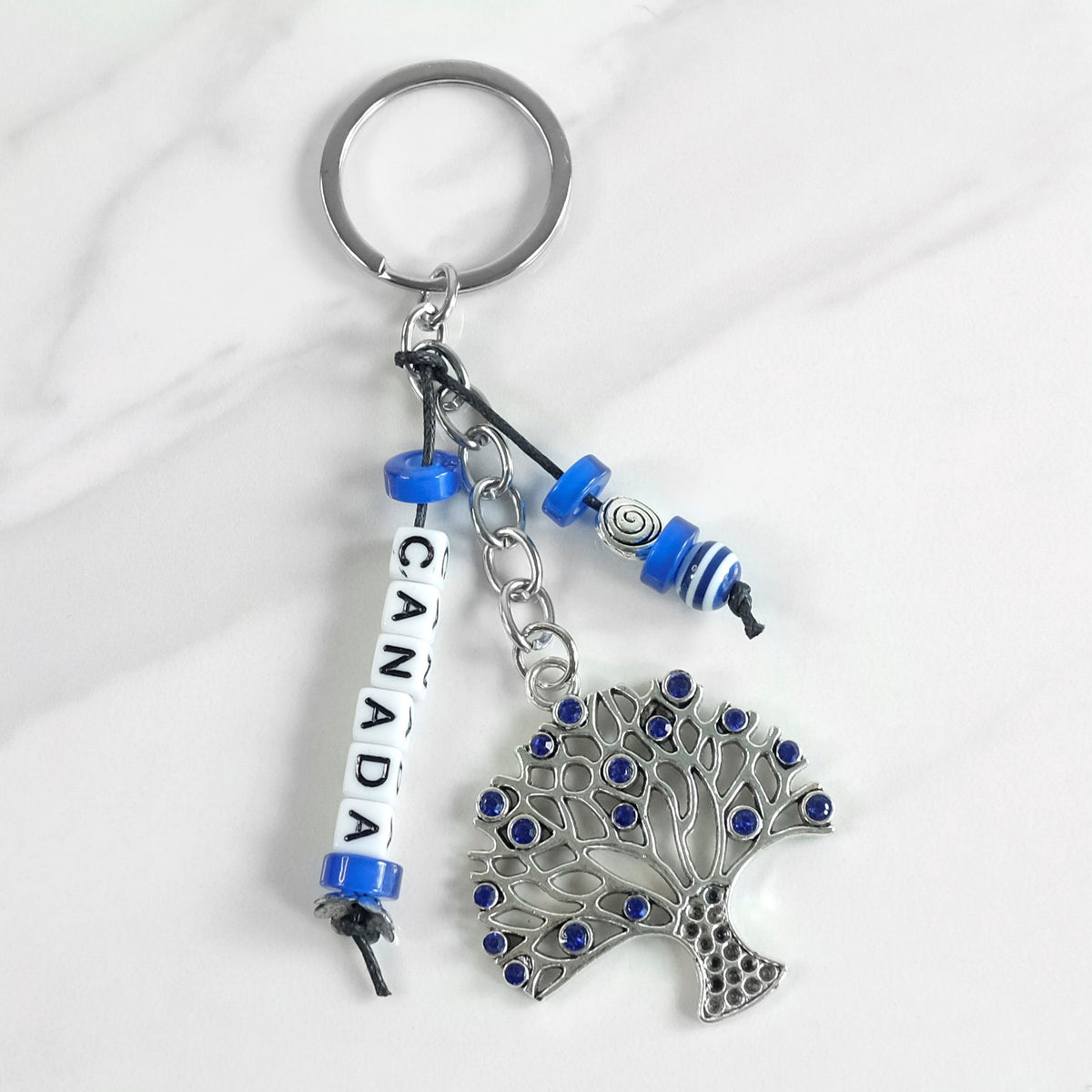 CANADA +TREE KEYCHAIN