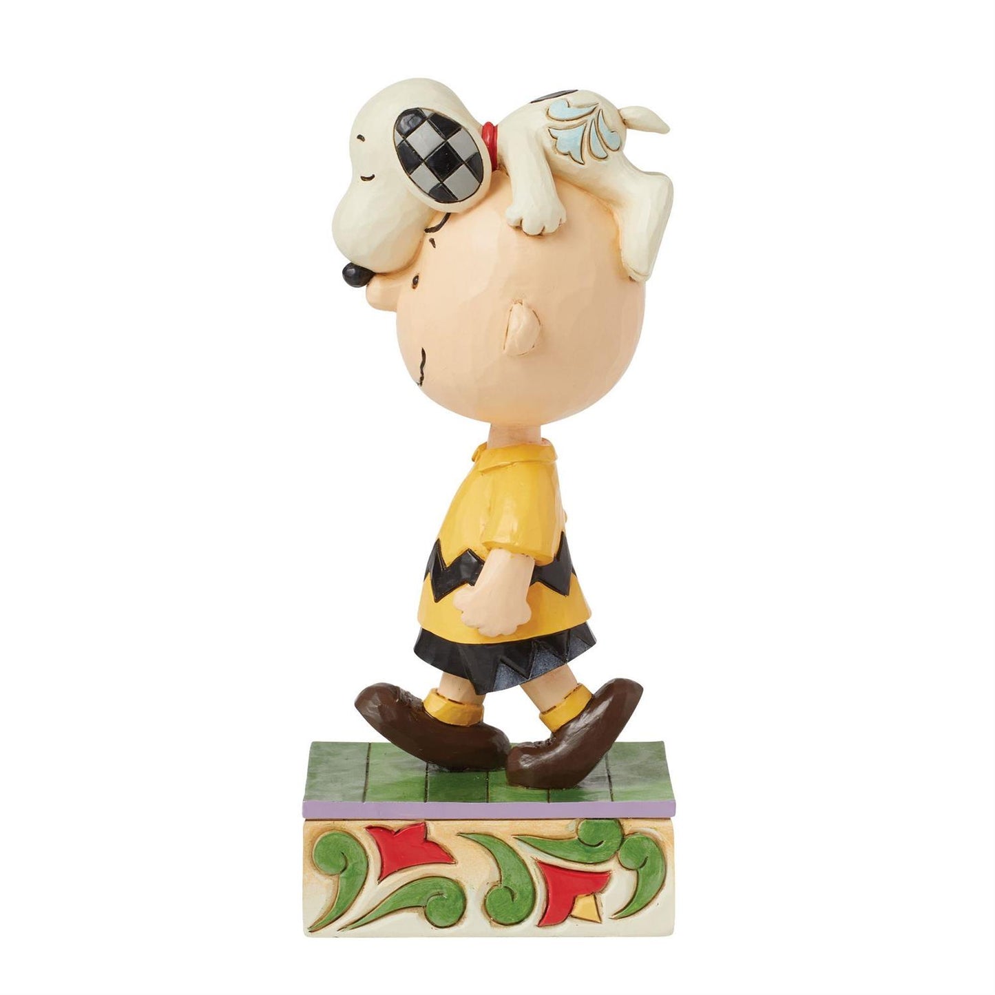 Snoopy on Charlie Brown's Head